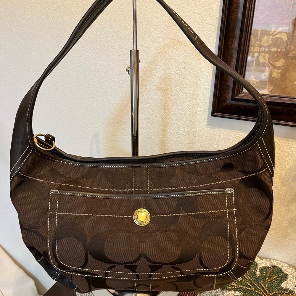 Coach Signature Dark Brown Hobo with dark brown leather trim shoulder bag.NWOT